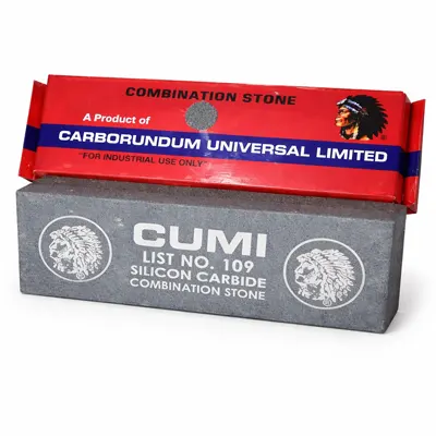 CUMI silicon carbide combination sharpening stone with grey block and red branded box, placed on a clean white background