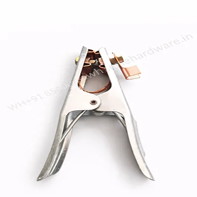 Silver welding earth clamp with copper contact jaw on white background, industrial grounding clip for arc welding machines.
