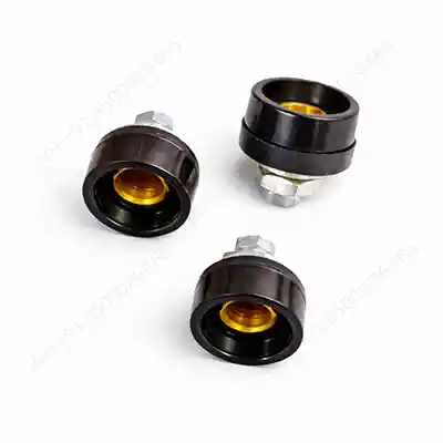 Black inverter welding panel sockets with brass inner contacts and steel bolts, placed on white background, industrial electrical connectors.